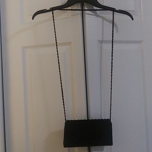 Woman evening purse embellished with black sequin beads. Has beaded strap 25inch